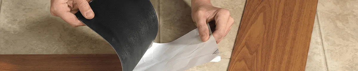 A professional installing vinyl flooring in Charleston, SC